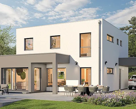 Fertighaus Stadtvilla kubischer Bau mit Flachdach, helle Klinkerfassade, große Fenster, Terrasse, Garten und Carport